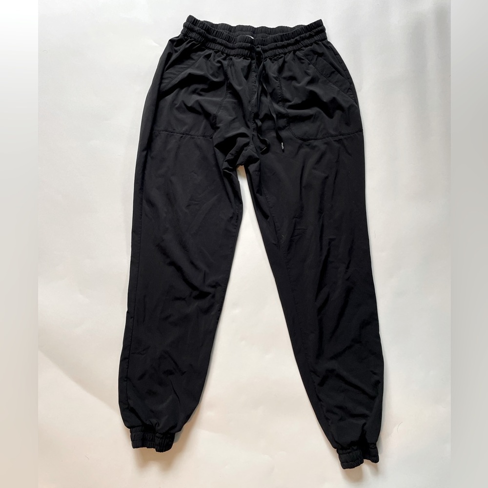 TNA drawstring track pants (black, size large)